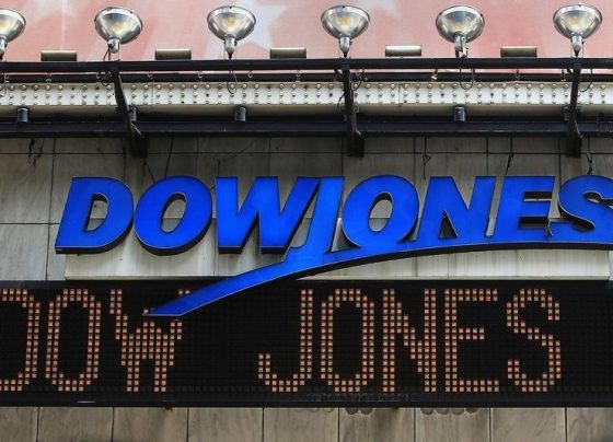 Индекс Dow закрылся на новом историческом максимуме после сигнала ФРС